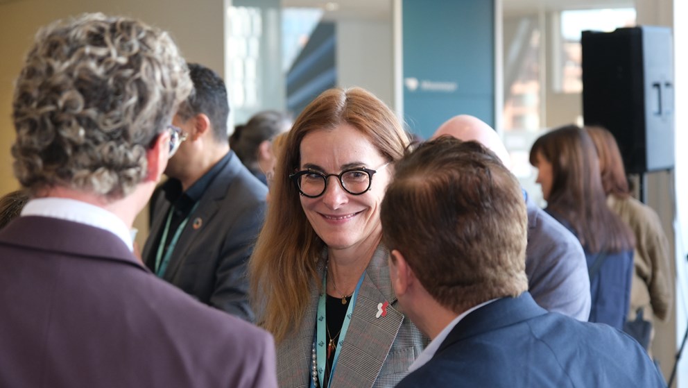 People networking during break