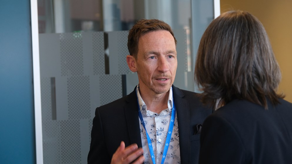 Man talking to woman